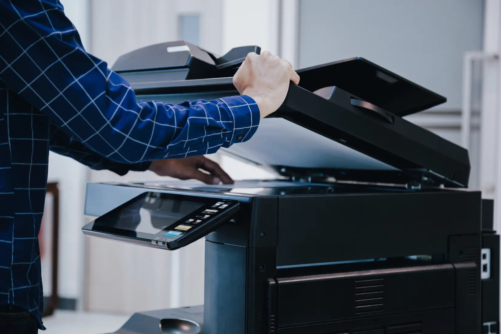 Using the control panel of a multifunction office copier
